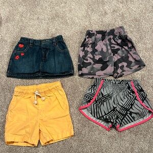 Three shorts and one denim skirt. 18 mths
